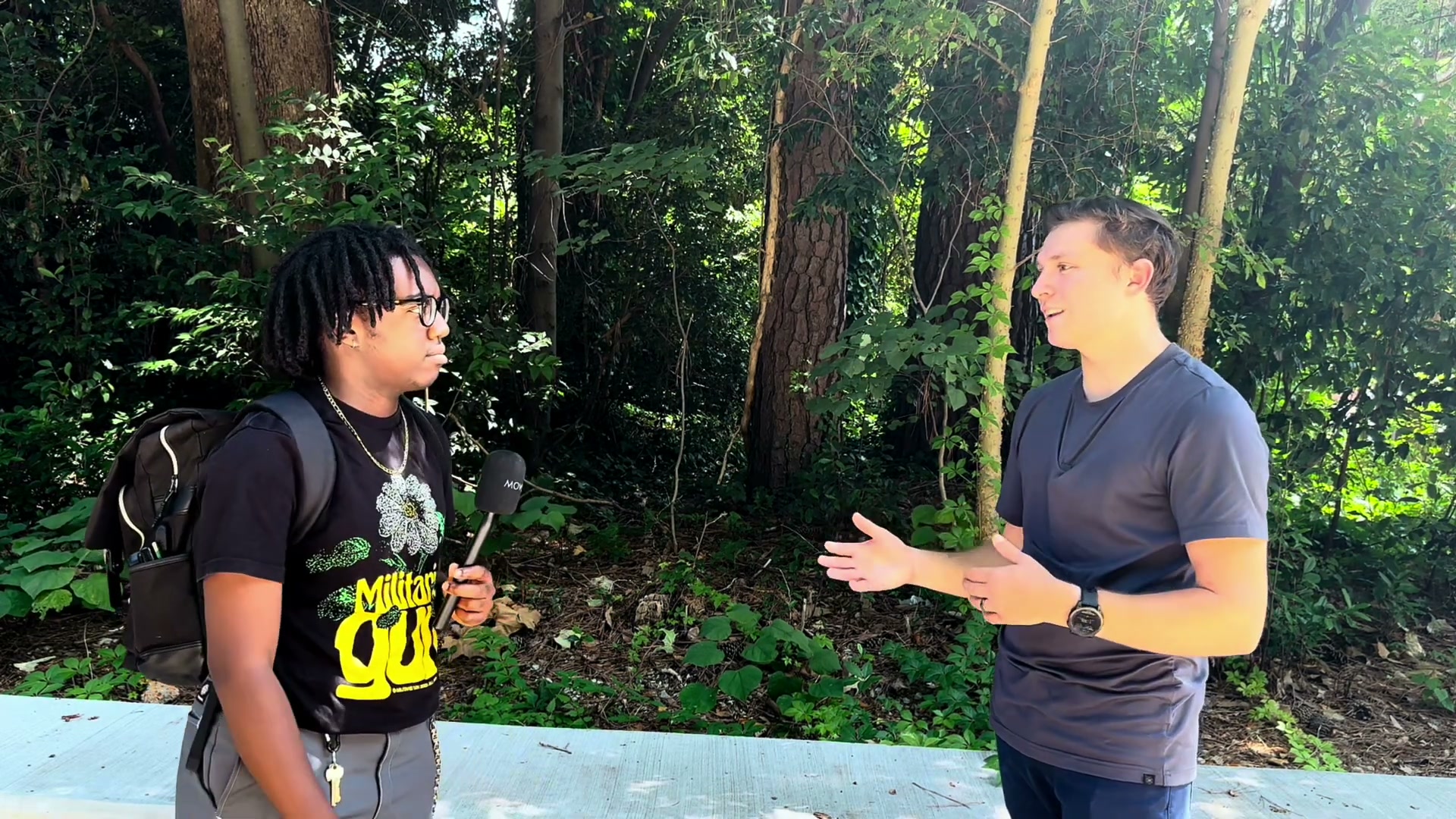 An outdoor campus conversation filmed for Gospel Advance