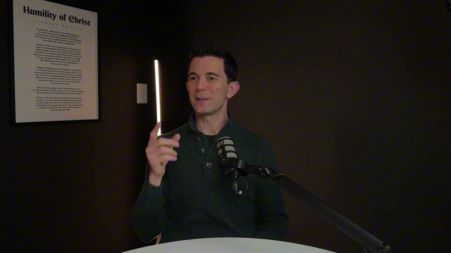 A guest sharing his testimony in the studio
